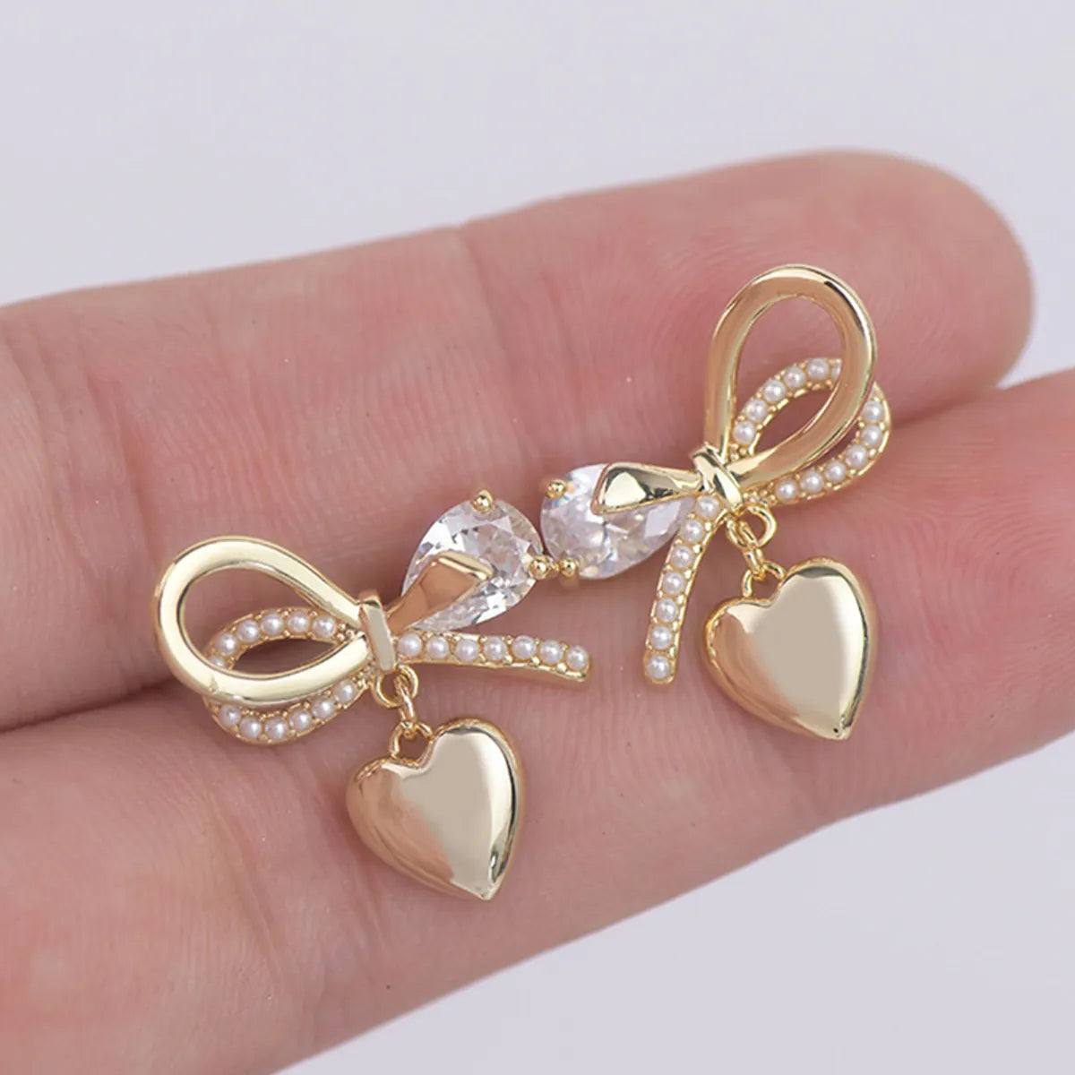 Minimalist Silver Earrings-1 Pair Fairy Style French Style Simple Style Heart Shape Bow Knot Plating Inlay Copper Artificial Pearls Zircon 14k Gold Plated Ear Studs